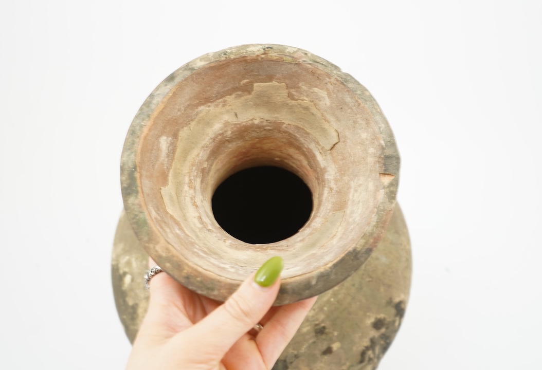 A large Chinese green glazed jar, Han dynasty